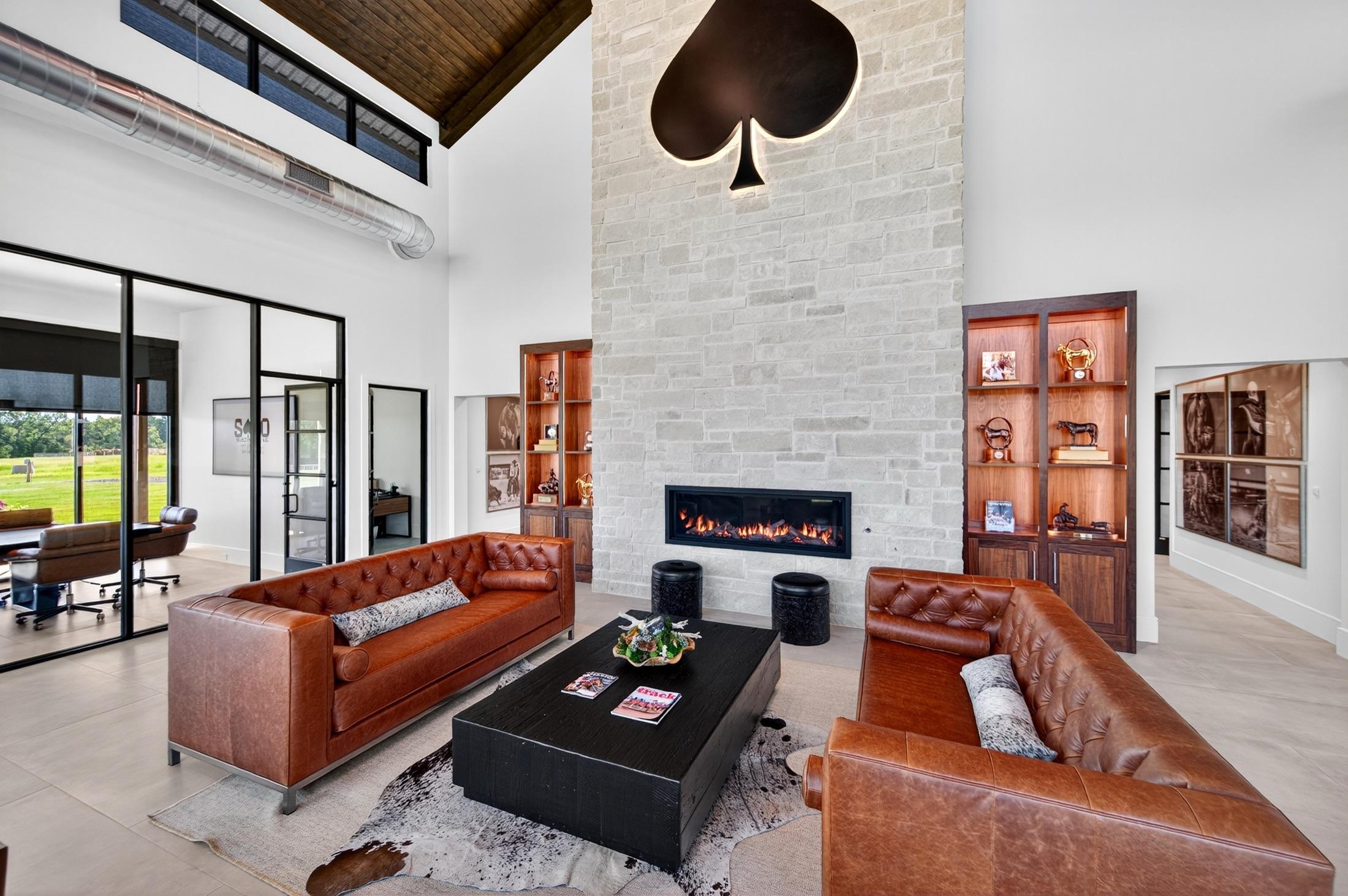 The client lounge, with the illuminated spade over the fireplace