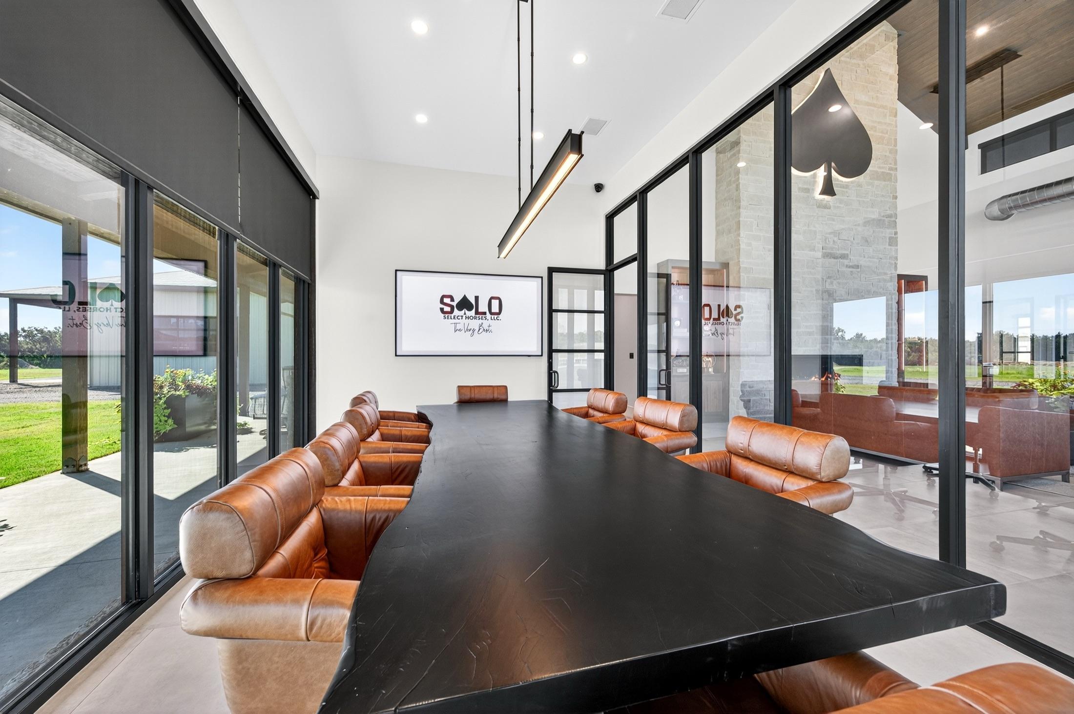 The conference room, with the Solo Select branding on screen