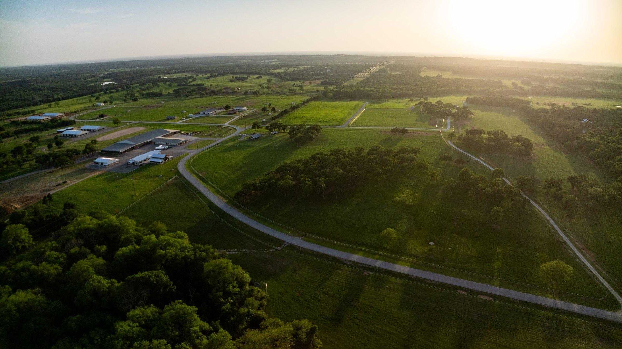 Aerial view of the Solo Select South ranch at sunset.