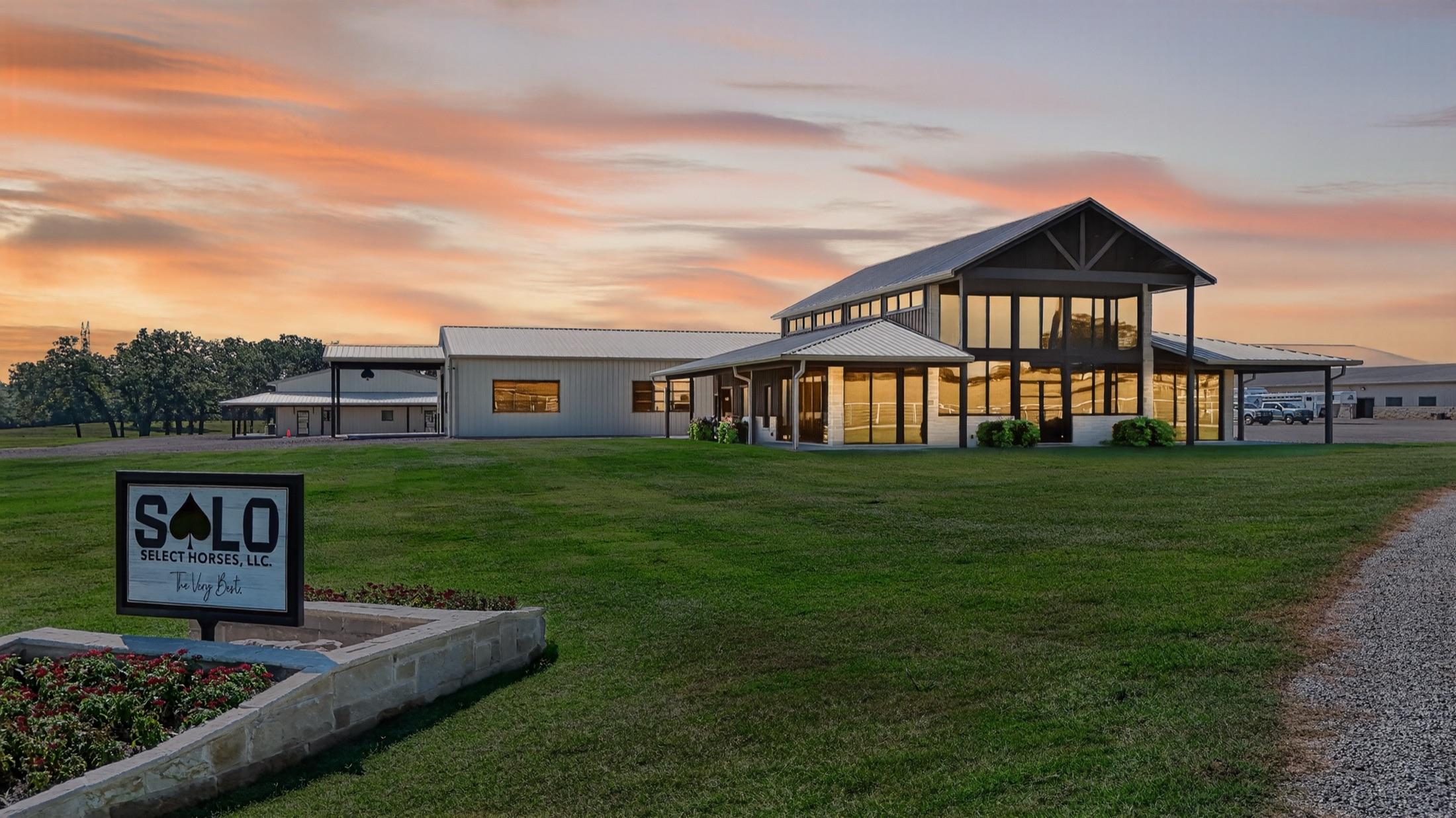 The Solo Select South ranch and sign at sunset