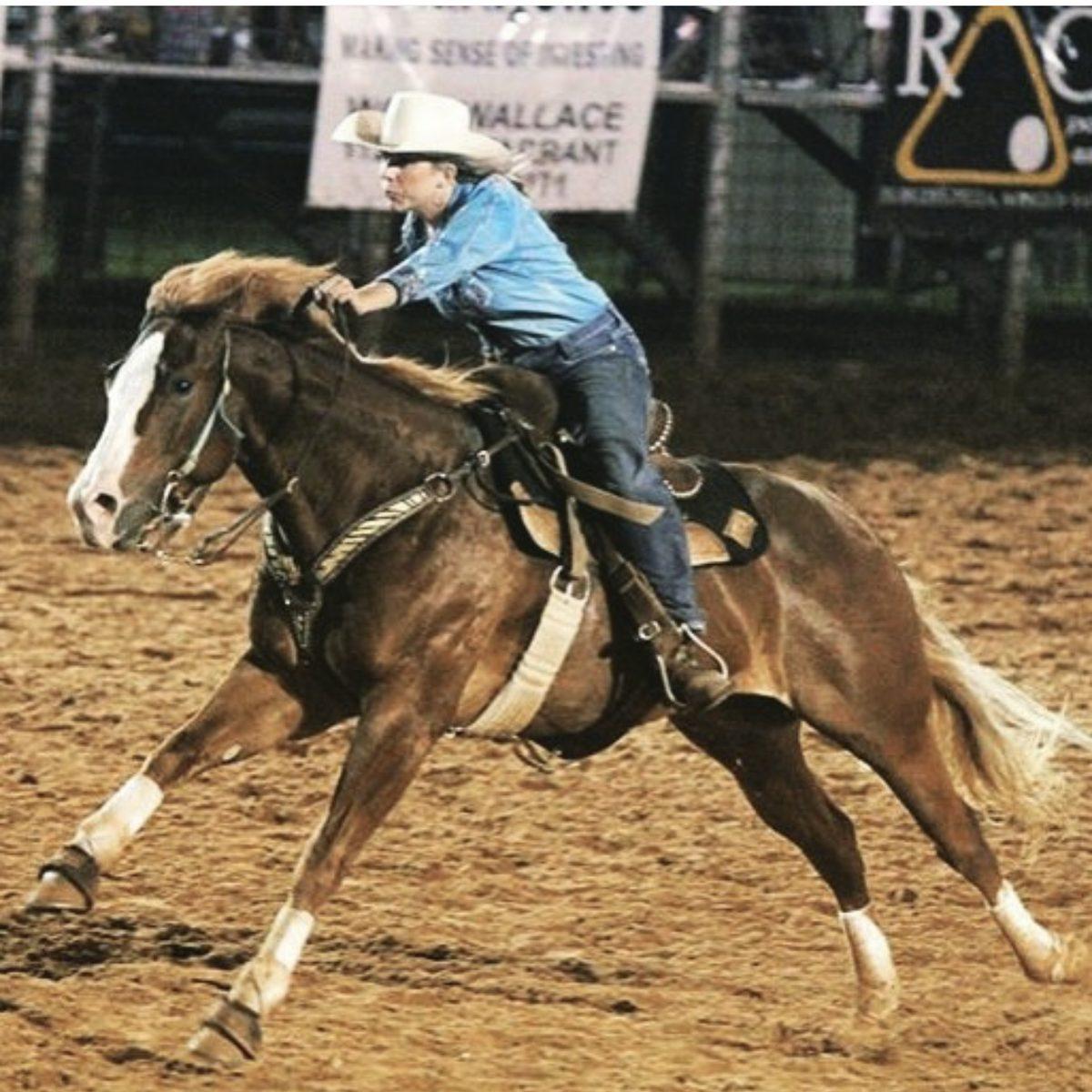 Melanie turning a barrel on Tuff Shot at the Bowie rodeo